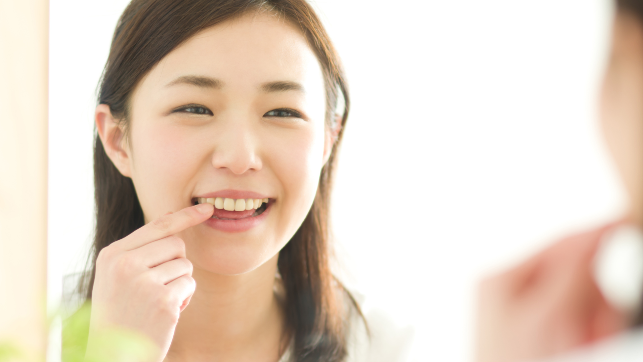 笑顔の女性 - 熊本市矯正歯科相談室